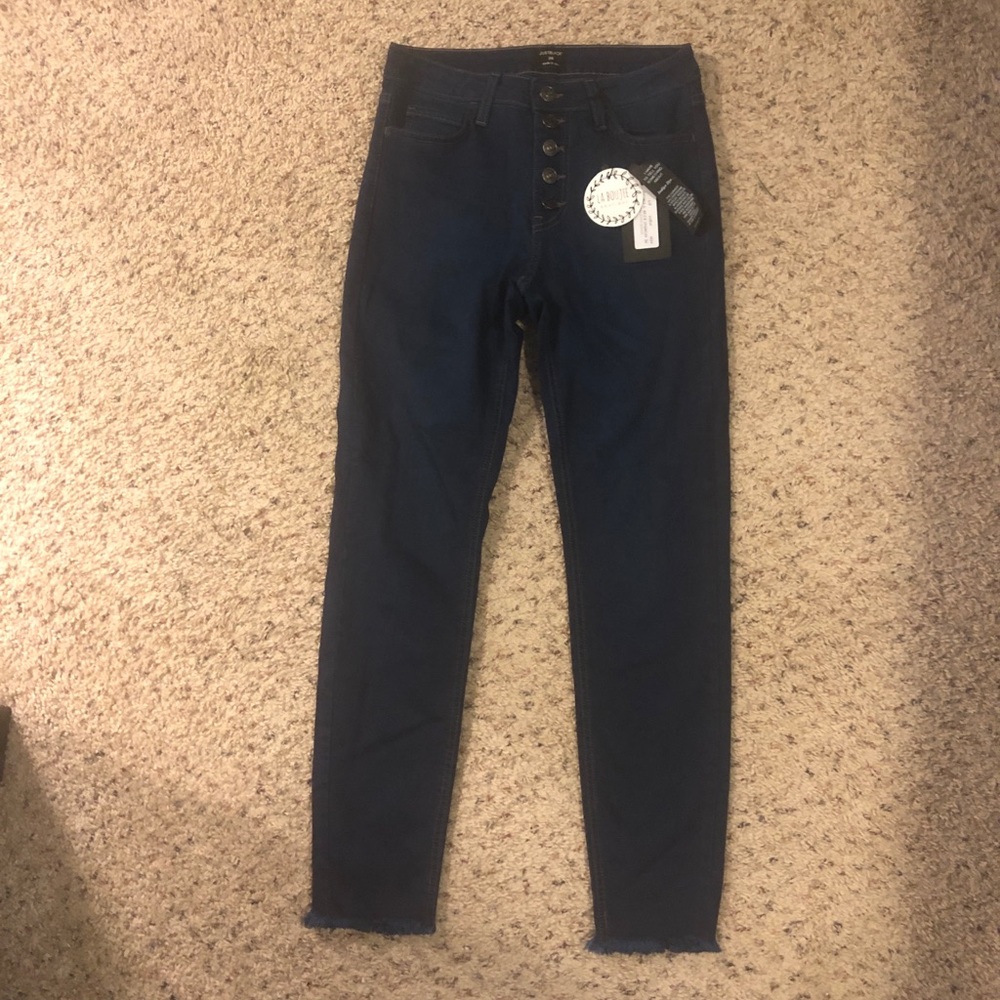 Skinny jeans with button fly